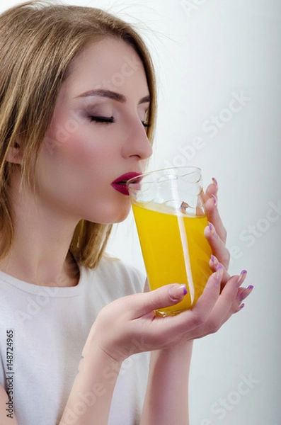 Fototapeta girl with orange juice