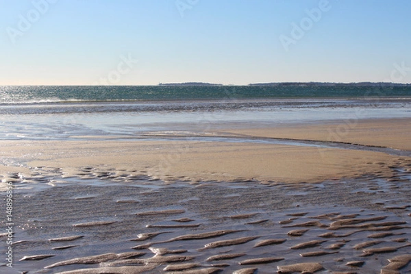 Fototapeta Empty Old Orchard Beach in winter.  Frozen ocean.