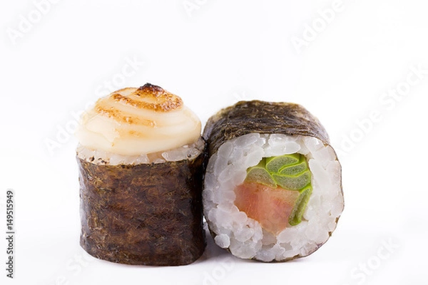 Fototapeta Traditional fresh Japanese sushi rolls on a white background. Roll with salmon and fresh green onions.