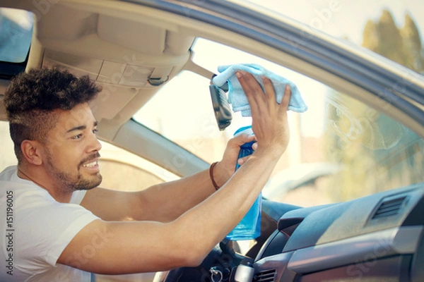 Fototapeta Man washing car