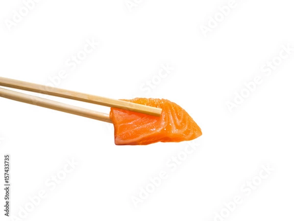 Fototapeta Salmon slice sashimi in chopsticks isolated on white background