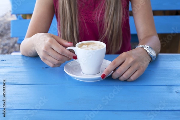 Fototapeta Young woman with cup of coffee 