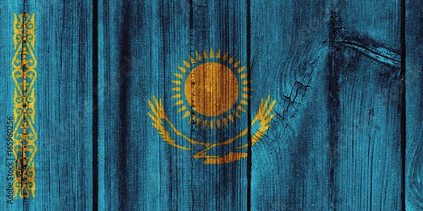 Fototapeta Kazakhstan flag painted on wooden wall for background