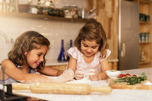 Fototapeta Little sisters girl preparing baking cookies.