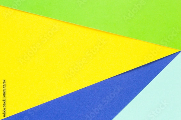 Fototapeta Colored papers geometry flat composition background with yellow, green and blue tones