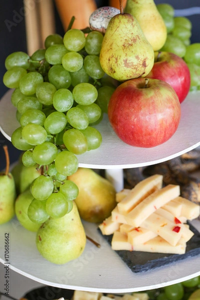 Fototapeta Close up of cheese and fruits