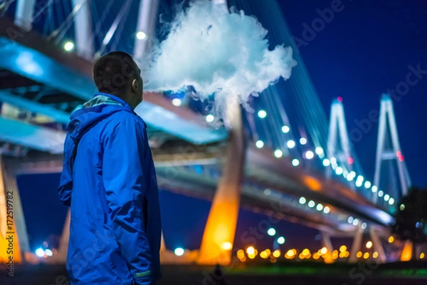 Fototapeta A cloud of smoke. Vape.