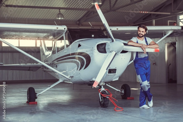 Fototapeta Mechanic and aircraft