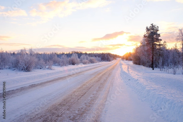 Fototapeta Beautiful snowy road in winter landscape