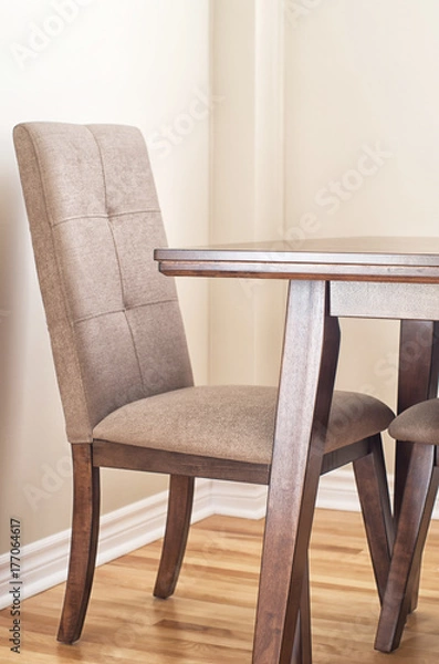 Fototapeta Closeup of wooden dining table and chair