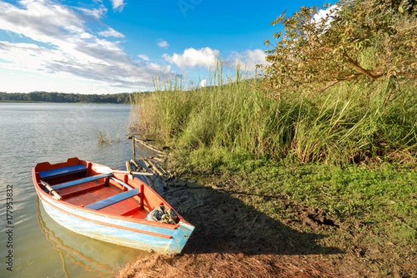 Fototapeta Landscape with a boat by the Bosque Azul Lake in Lagunas de Montebello National Park Chiapas, Mexico