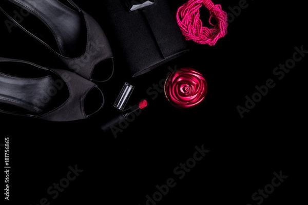 Fototapeta Fashion Lady Accessories Set. Black and pink. Minimal. Shoes, bracelet, perfume, lipstick and bag on black background. Flat lay.