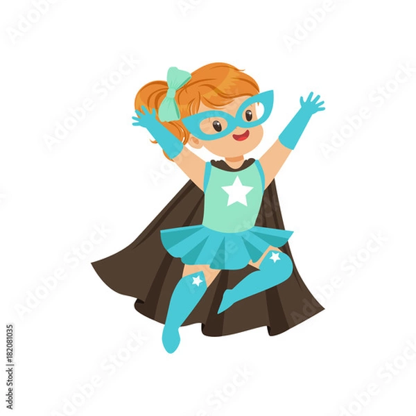 Fototapeta Comic brave kid in superhero blue costume with mask and developing in the wind black cape, flying with hands up.