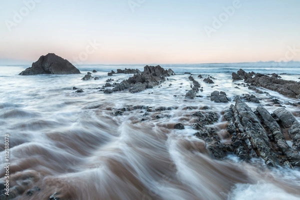 Fototapeta the beach of the Vega, Asturias, one of the most beautiful of this fabulous coast where dinosaur tracks are found ...