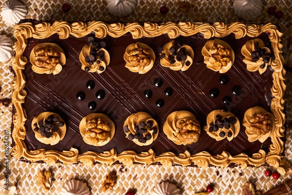 Fototapeta Chocolate cake with walnut