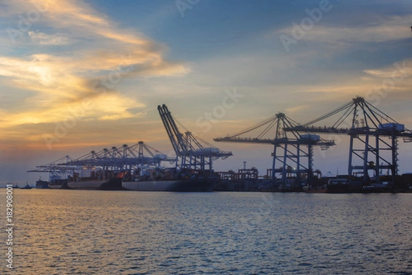 Fototapeta the vessel ships in port terminal are in loading and discharging containers cargo, services for export and import shipment to worldwild logistics