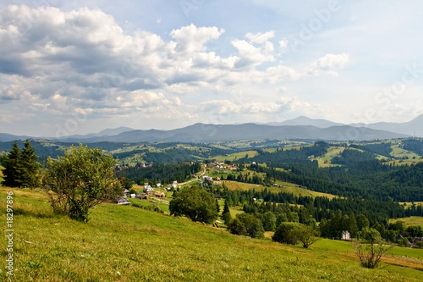 Fototapeta Rural landscape with hills and mountains