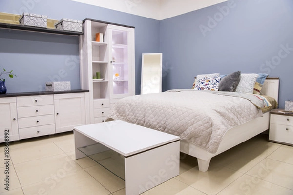 Fototapeta cozy modern bedroom interior with bed