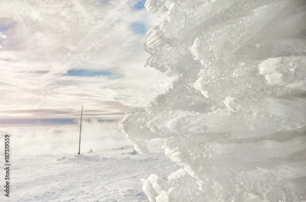 Fototapeta Natural ice formation, winter background, selective focus.