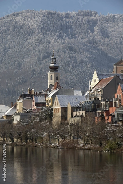 Fototapeta cityscape frohnleiten on river mur in winter, styria, austria