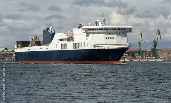 Fototapeta Marine ferry in the background of the port waters