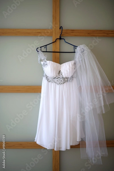 Fototapeta Wedding dress and veil