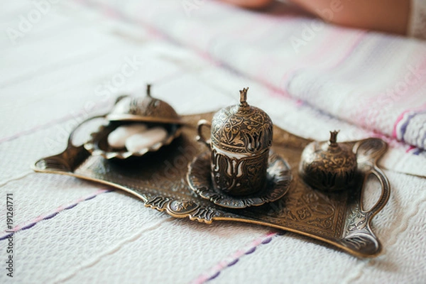 Obraz Turkish tasty tea in traditional glasses and pot on white background, good morning