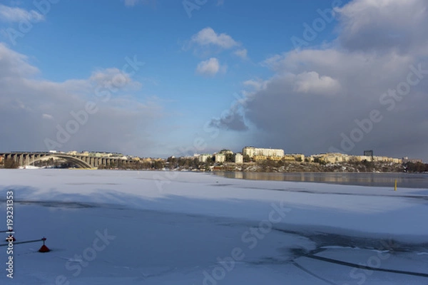 Fototapeta A snowy, cold and sunny view of the island Kungsholmen in Stockholm