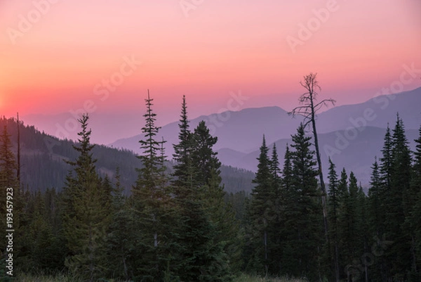 Fototapeta Hazy sunset over the Montana wilderness