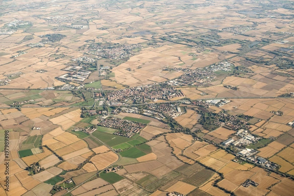 Fototapeta Spring in Italy. Aerial View with Meadows. Small Town.