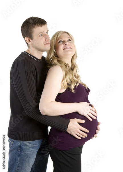 Fototapeta expecting parents against white background .