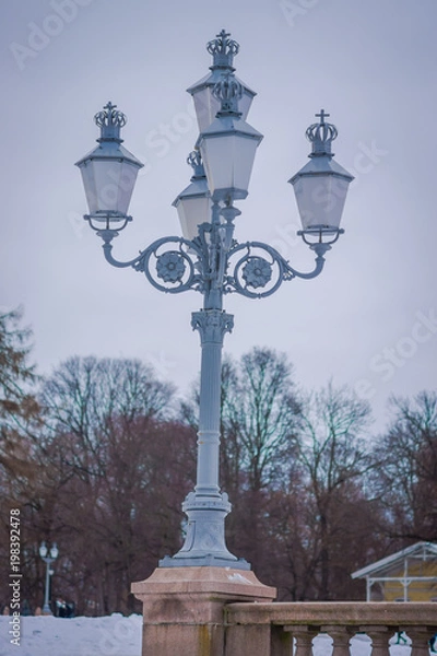 Fototapeta Close up of public park lantern at the Royal Palace in Oslo