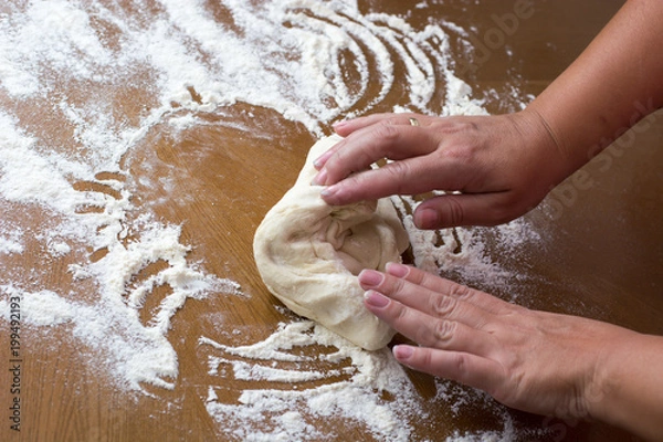 Obraz Woman making dough with meat at home