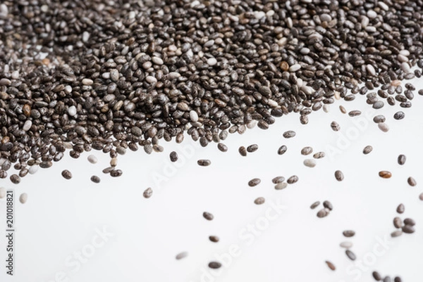 Fototapeta Chia seeds isolated with white background. Healthy superfood.