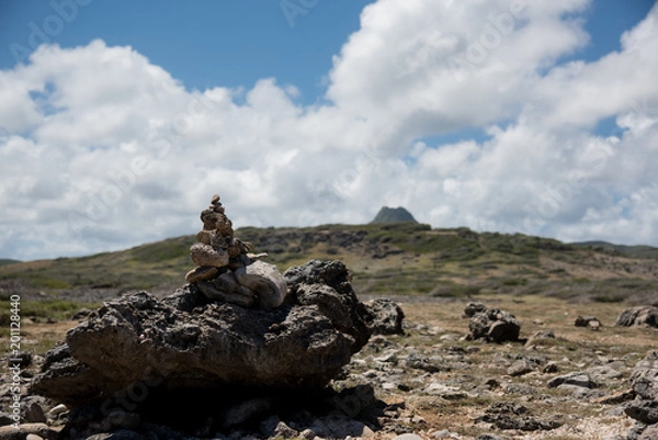 Fototapeta Zen rocks  outdoors with mountains on background