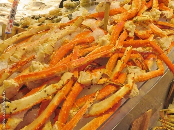 Obraz Alaskan King Crab legs for sell at a fish market;