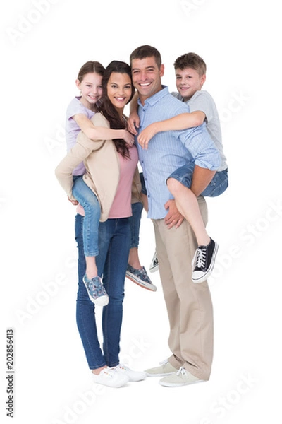 Fototapeta Parents giving piggyback ride to children over white background