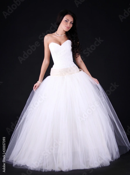 Fototapeta beatiful young woman in wedding dress