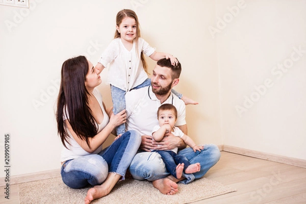 Fototapeta The parents spend time with their children