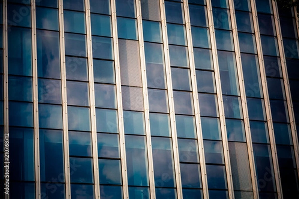 Fototapeta Urban abstract - windowed corner of office building.