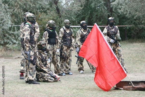 Fototapeta Paintball team with flag