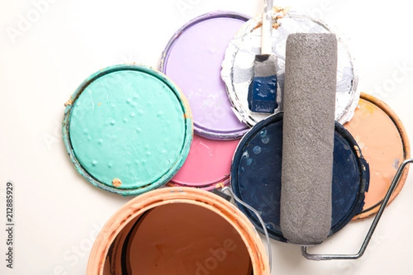 Fototapeta Paint can and lids with roller and brush