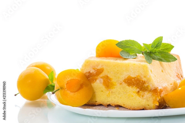 Fototapeta sweet curd casserole stuffed with yellow plums inside