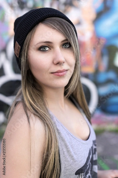 Fototapeta Beautiful Youthful Young Skater Woman in Urban Environment