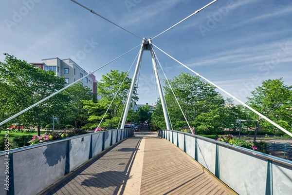 Fototapeta Pedestrian bridge on the Ruoholahti Canal, Helsinki, Finland