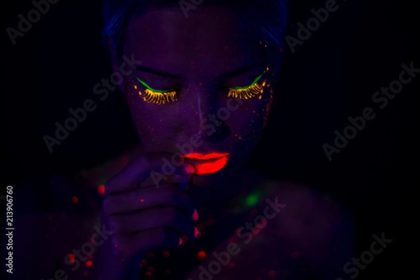 Obraz Portrait of Beautiful Fashion Woman in Neon UF Light. Model Girl with Fluorescent Creative Psychedelic MakeUp, Art Design of Female Disco Dancer Model in UV, Colorful Abstract Make-Up