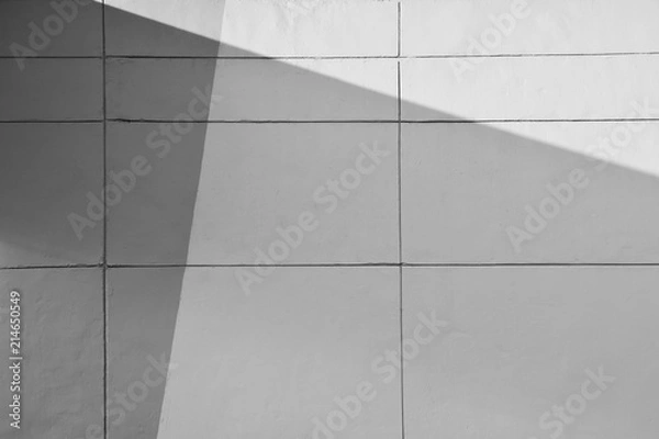 Fototapeta white cement wall with line and shadow