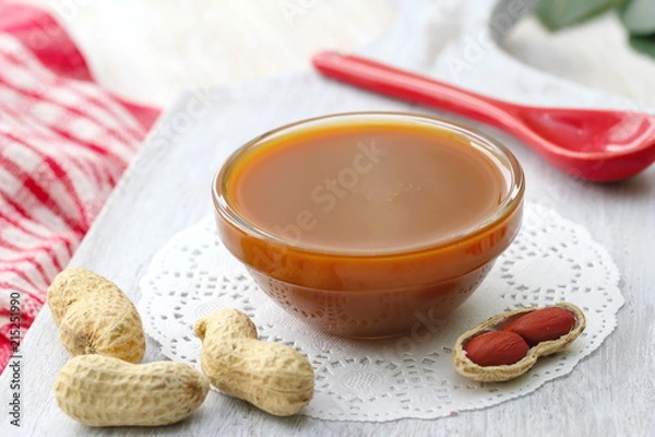 Fototapeta Peanut butter on a glass bowl