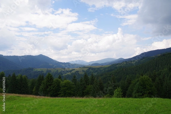 Fototapeta mountain landscapes among fields and green trees