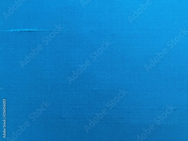 Fototapeta Woven texture of silk fabric or yarn blue turquoise color for background. Advertising copy space.